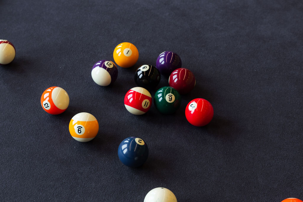 Close up of 8 ball pool table.